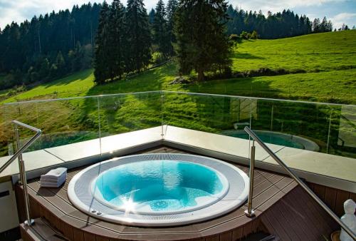 Jacuzzi, Natur, heiß, entspannen, Hotel edita, Urlaub, Bodenseenähe, Berge, Allgäu
